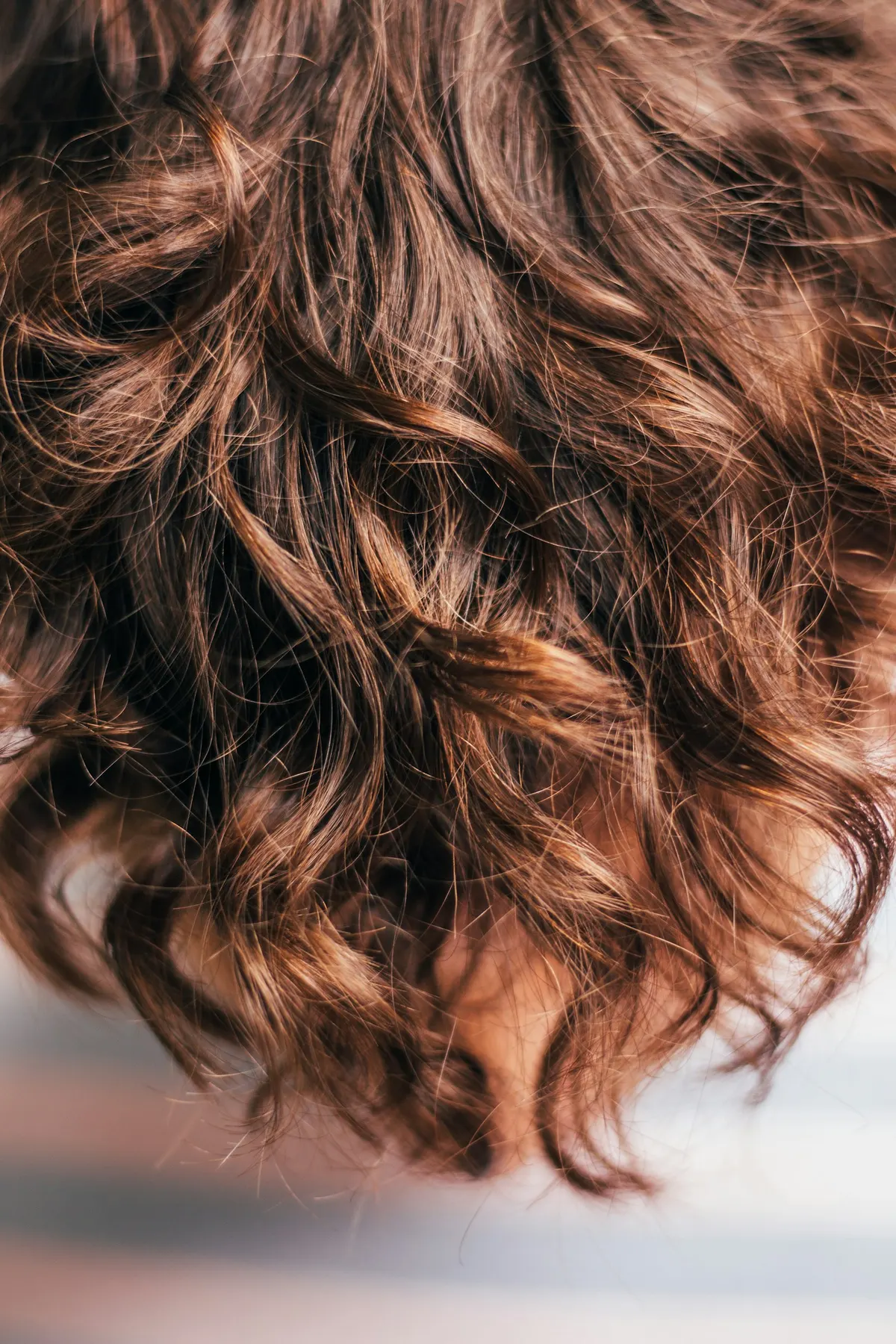 Close-up of glossy, voluminous waves